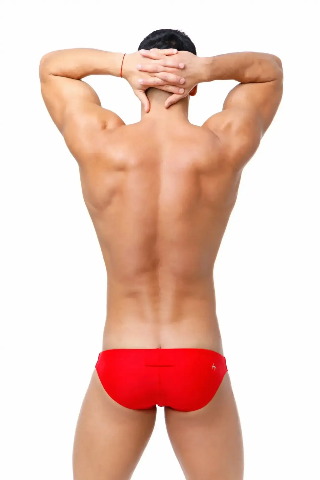 Red swim trunks with a small gold logo on the lower right side from marcuse inflate bikini swimwear collection