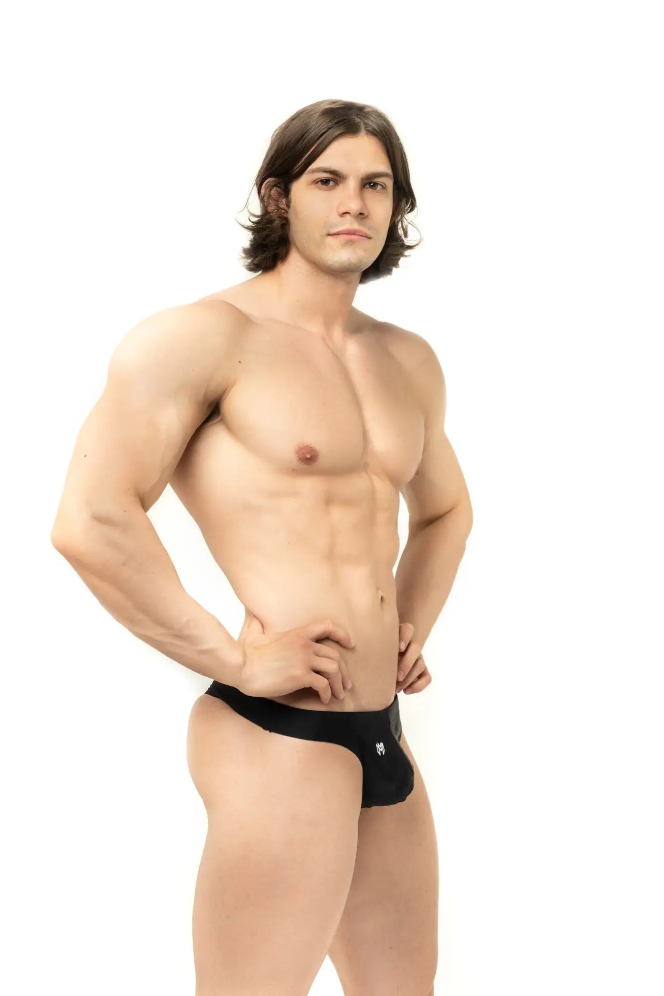 Black marcuse inflate thong swimwear with a small white logo on the front made of stretchy athletic fabric