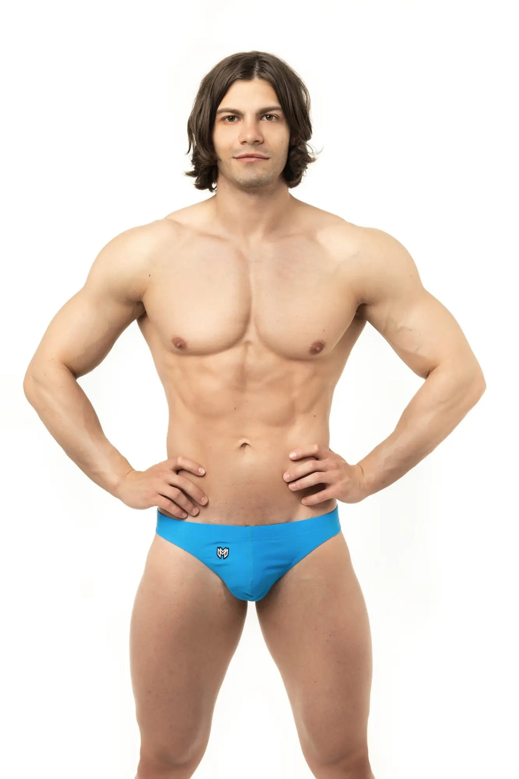 Marcuse inflate thong swimwear in bright blue with a small white logo on the front designed for athletic use