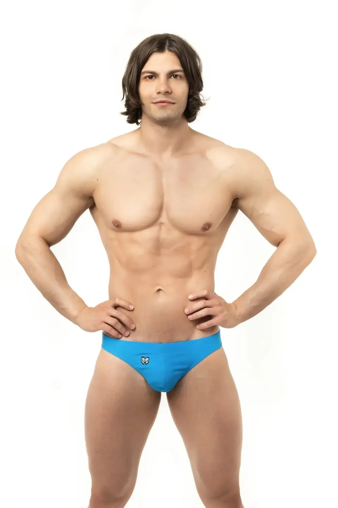 Marcuse inflate thong swimwear in bright blue with a small white logo on the front designed for athletic use
