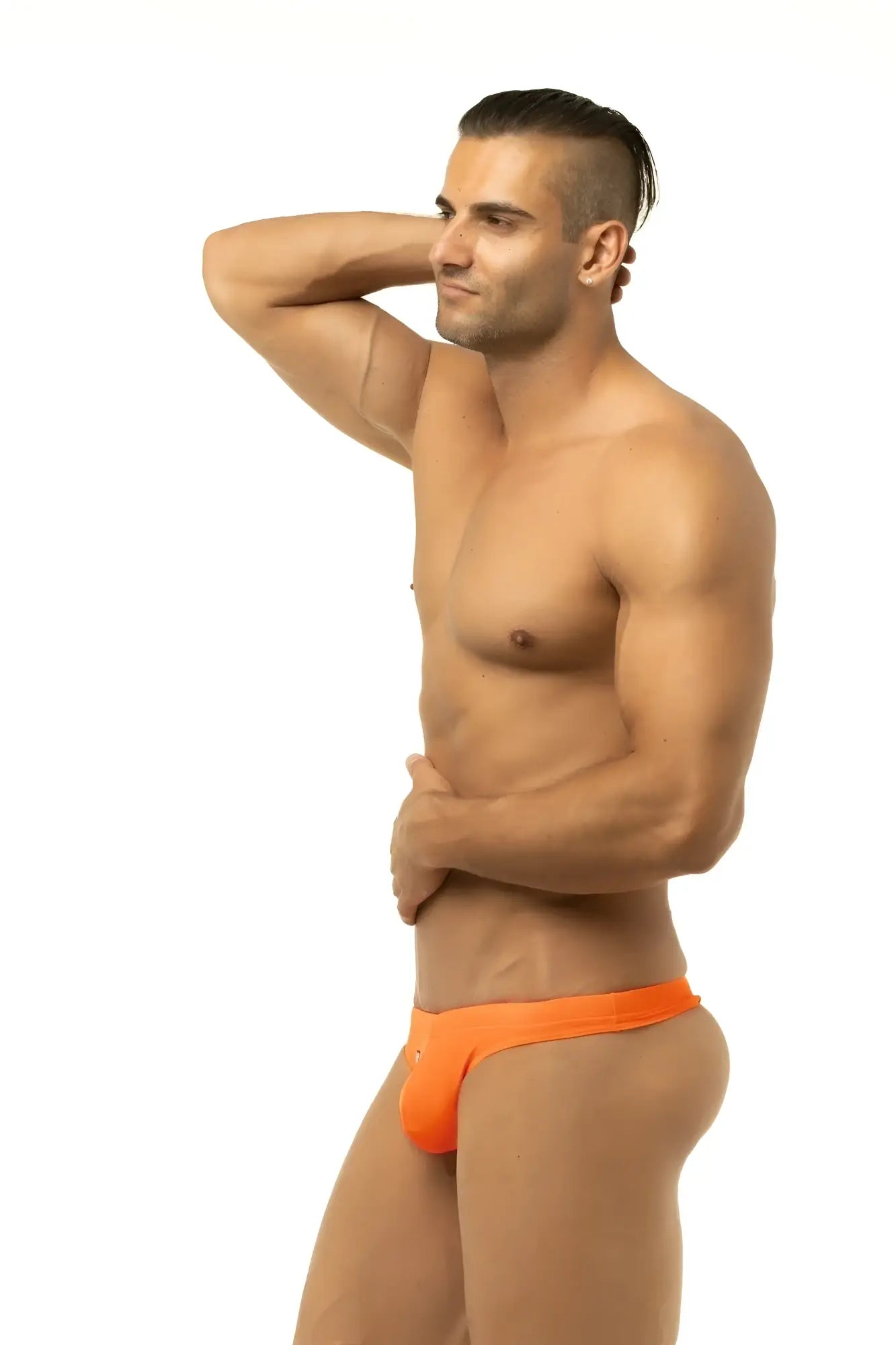 Bright orange Marcuse Inflate thong swimwear briefs featuring athletic design for swim and active use