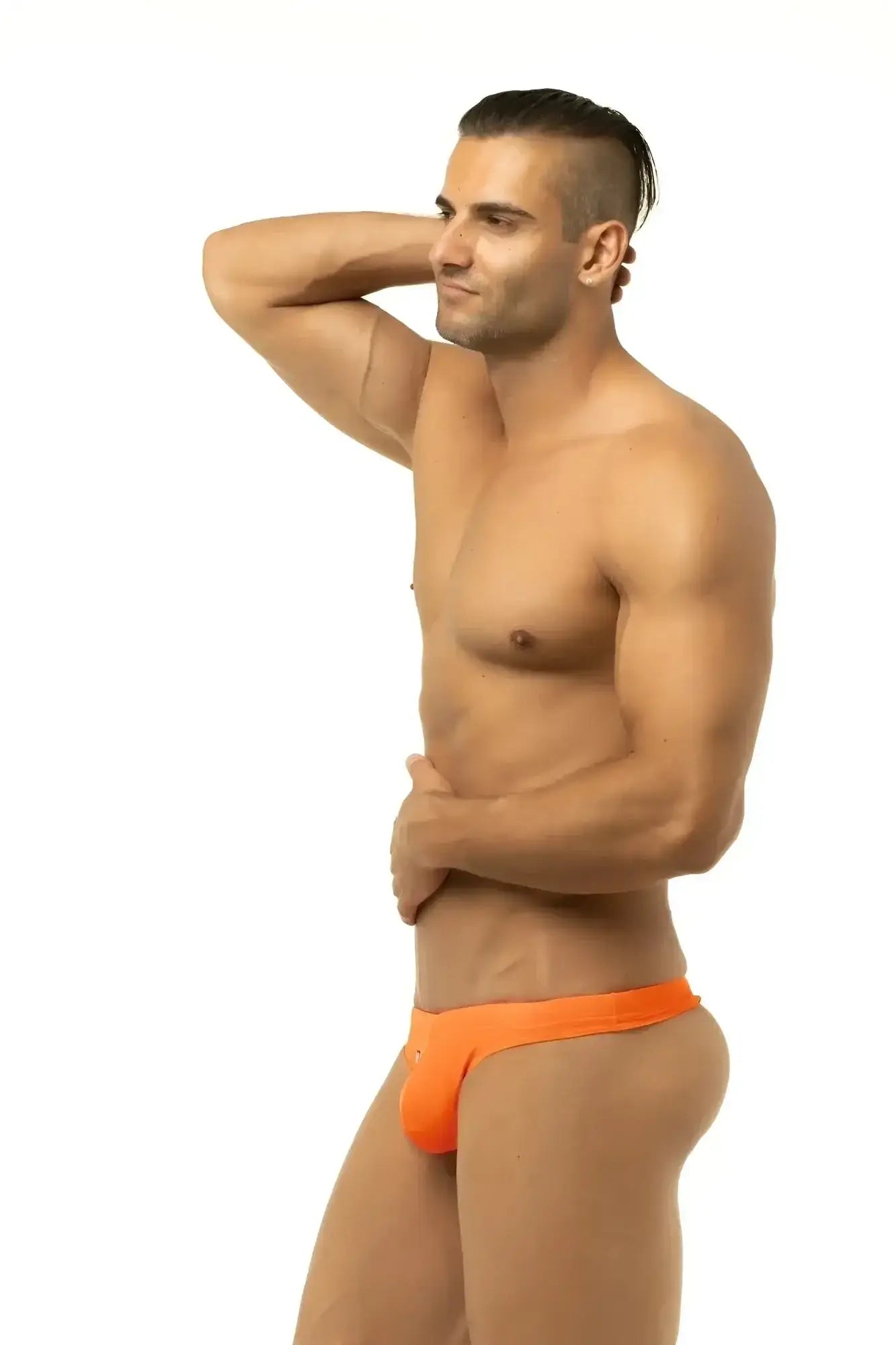 Bright orange Marcuse Inflate thong swimwear briefs featuring athletic design for swim and active use