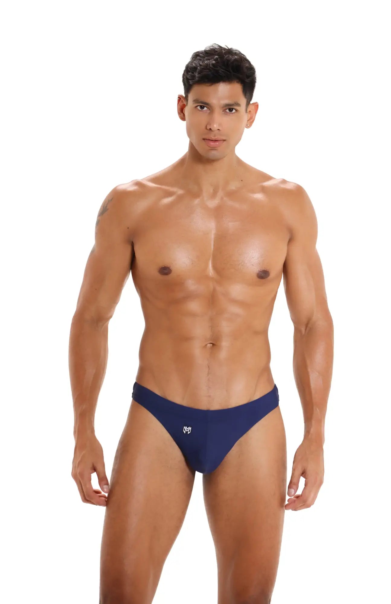 Navy blue Marcuse Inflate thong swimwear briefs with a small white logo on the left hipband designed for swimming