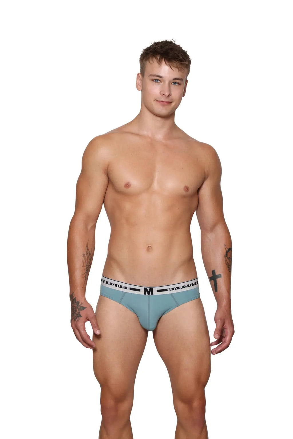 Light blue marcuse intimate brief underwear with white elastic waistband featuring black lettering and m logo