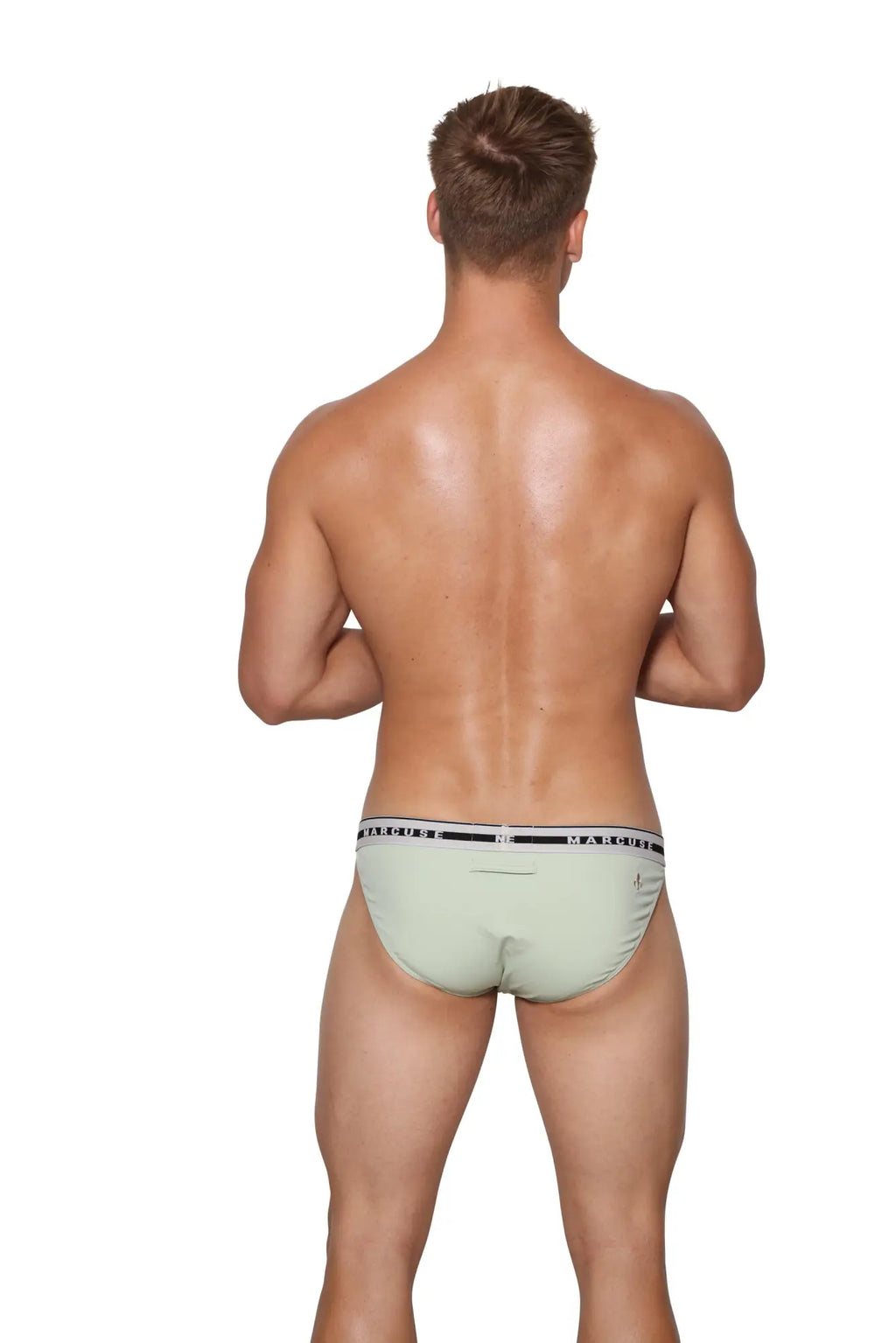 Light green Marcuse intimate hipster men’s briefs with a black and white striped waistband featuring the brand logo