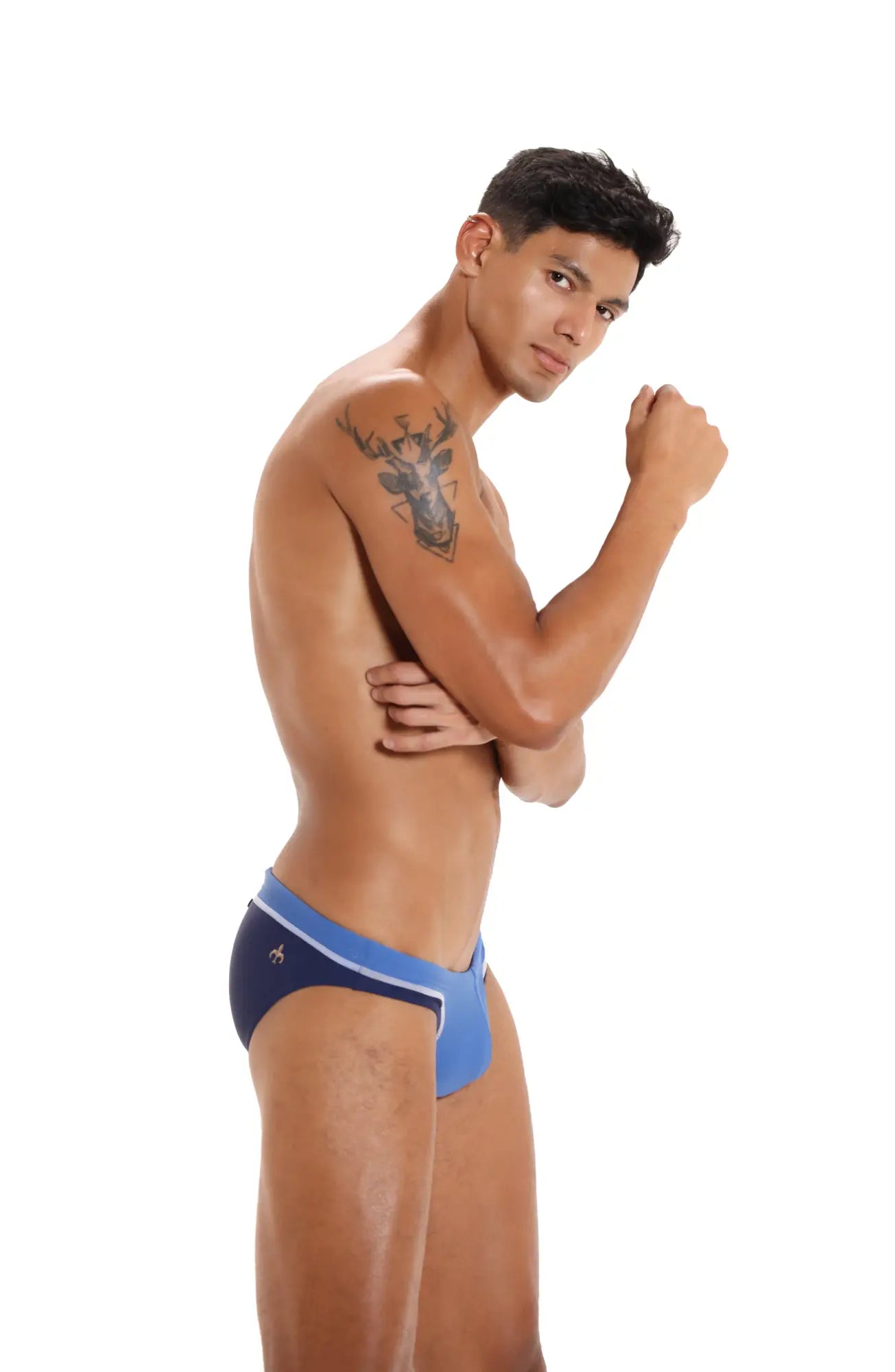 Marcuse Joyeux bikini swimwear in blue and navy men’s briefs with white trim for stylish swim use