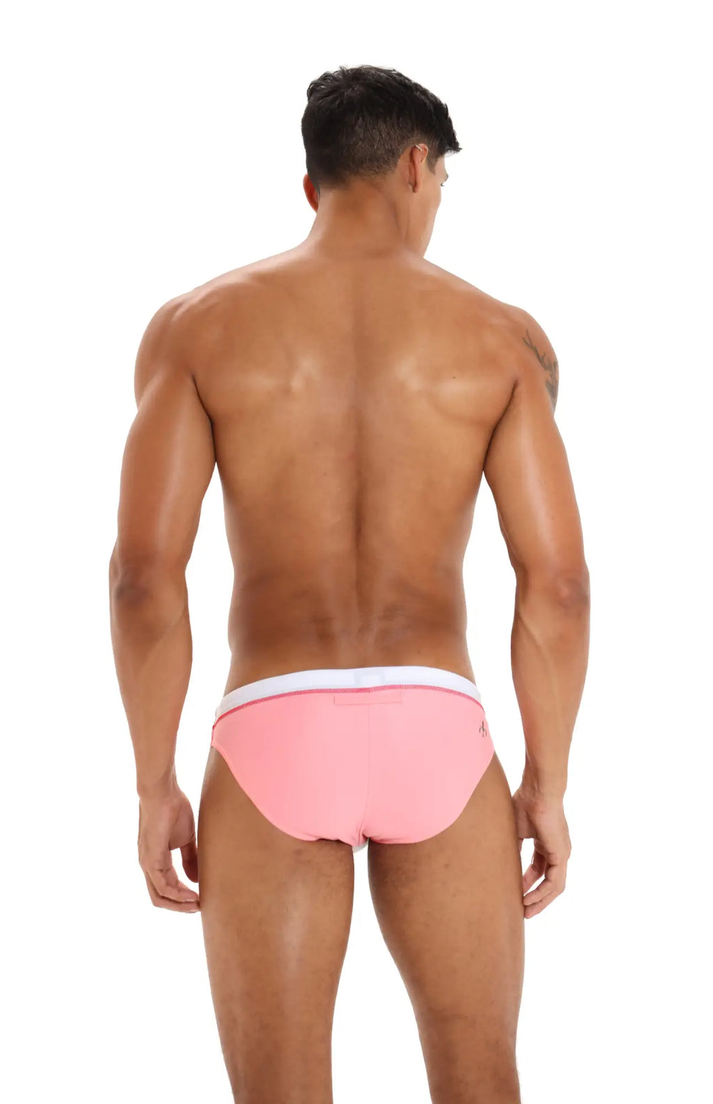 Pink swim trunks with a white waistband from marcuse joyeux bikini swimwear made for beach and pool use
