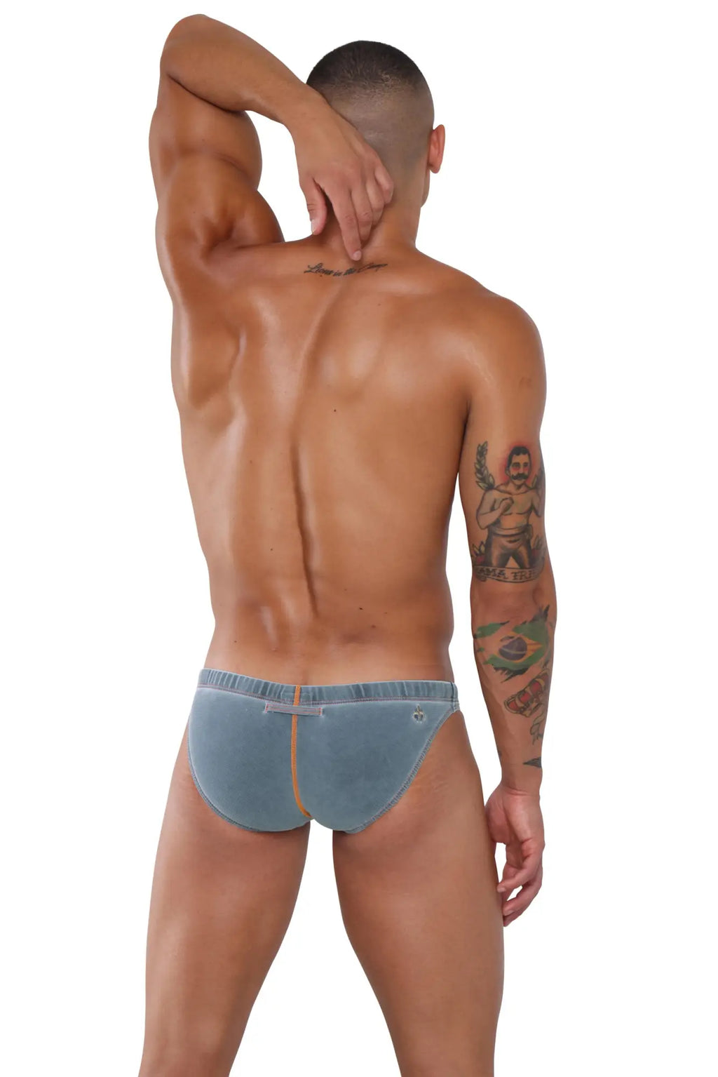 Blue denim briefs with subtle orange seam detail from marcuse koper bikini swimwear collection