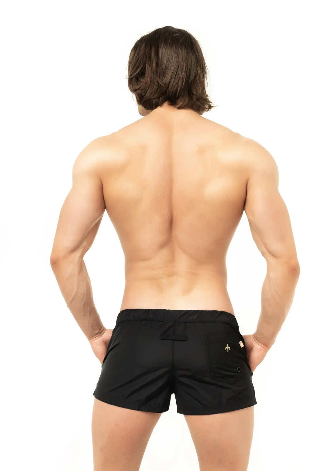 Marcuse League shorts black athletic shorts with small gold logo on right hip designed for active wear
