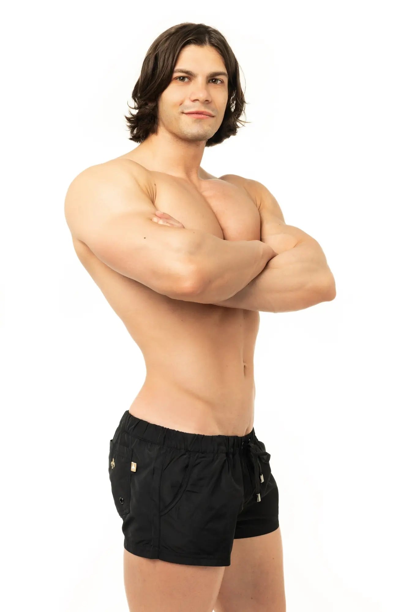 Marcuse league shorts are black athletic shorts with gold-tone hardware accents designed for active wear