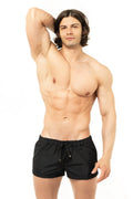 Marcuse league black athletic shorts with a drawstring waistband and subtle gold logo on the side