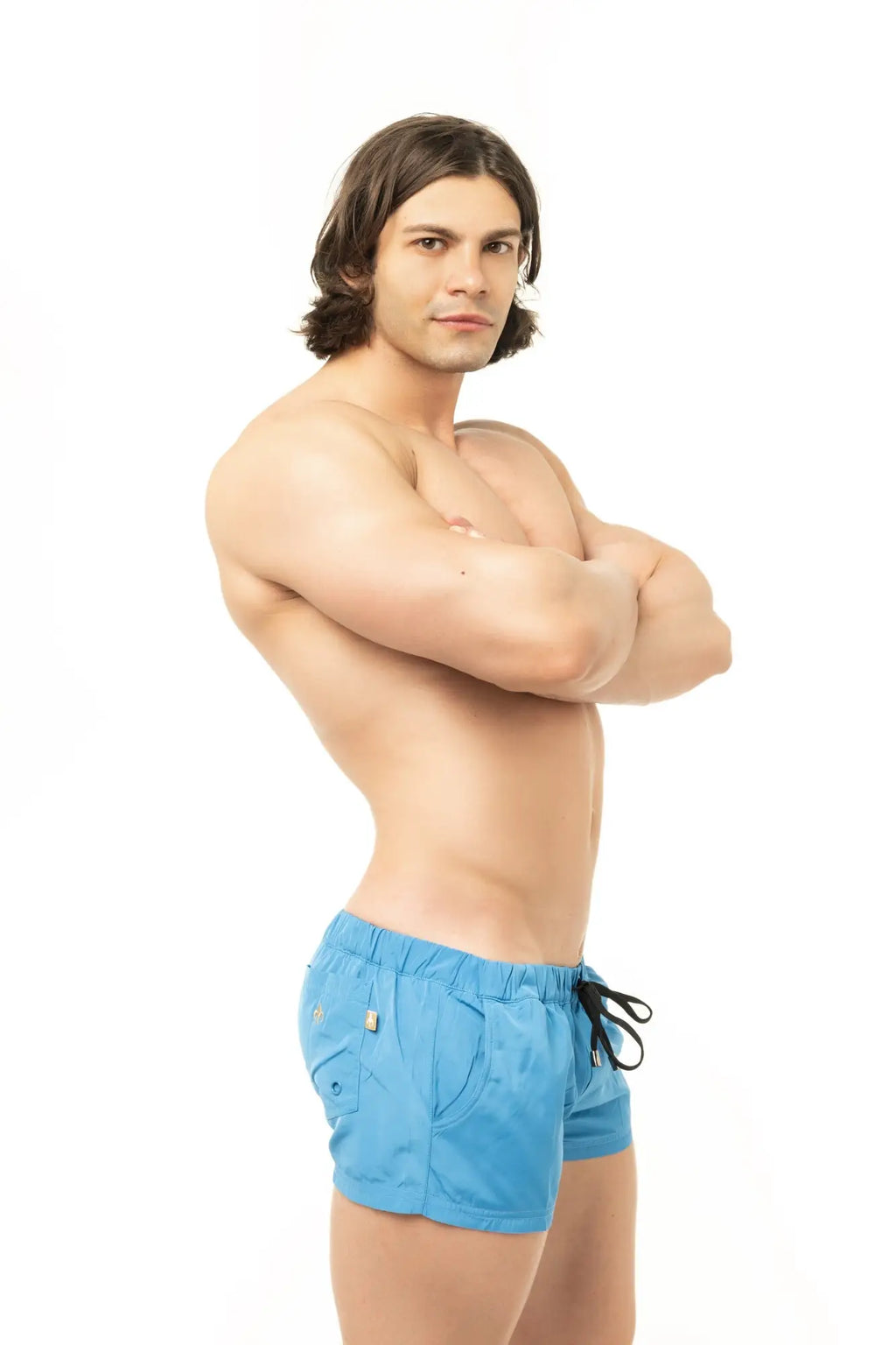 Marcuse league shorts bright blue swim trunks with black drawstring and gold logo on side pocket
