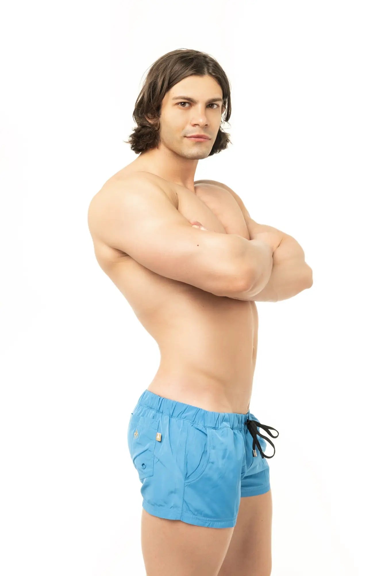 Marcuse league shorts bright blue swim trunks with black drawstring and gold logo on side pocket