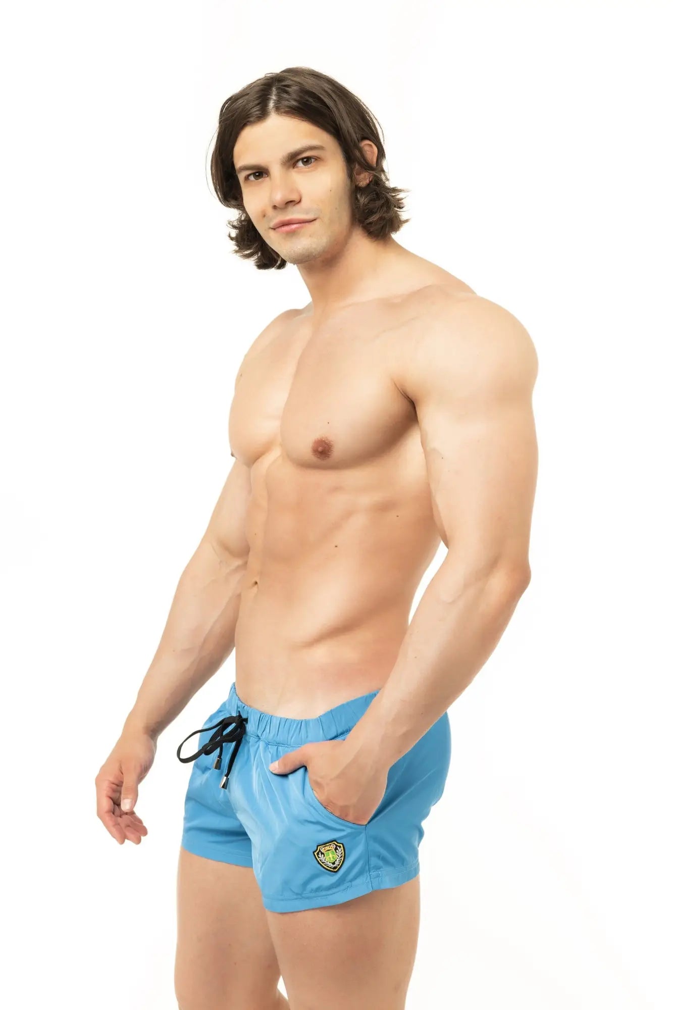 Marcuse league shorts light blue athletic swim trunks with black drawstrings and a yellow logo on the lower left leg