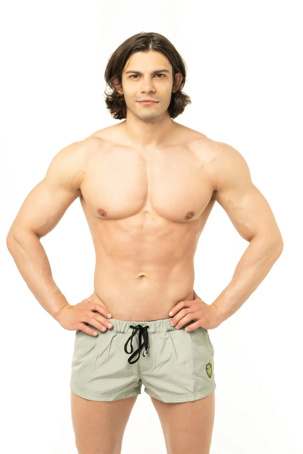 Marcuse league shorts light green athletic shorts with black drawstring and small gold emblem on the side