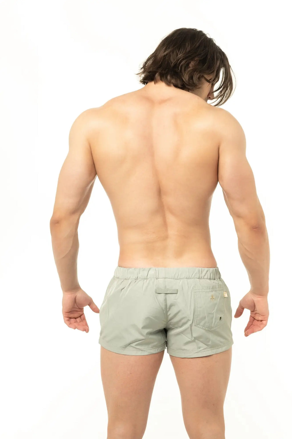Marcuse league shorts are light green athletic shorts with a drawstring waistband and side pockets for comfort and convenience