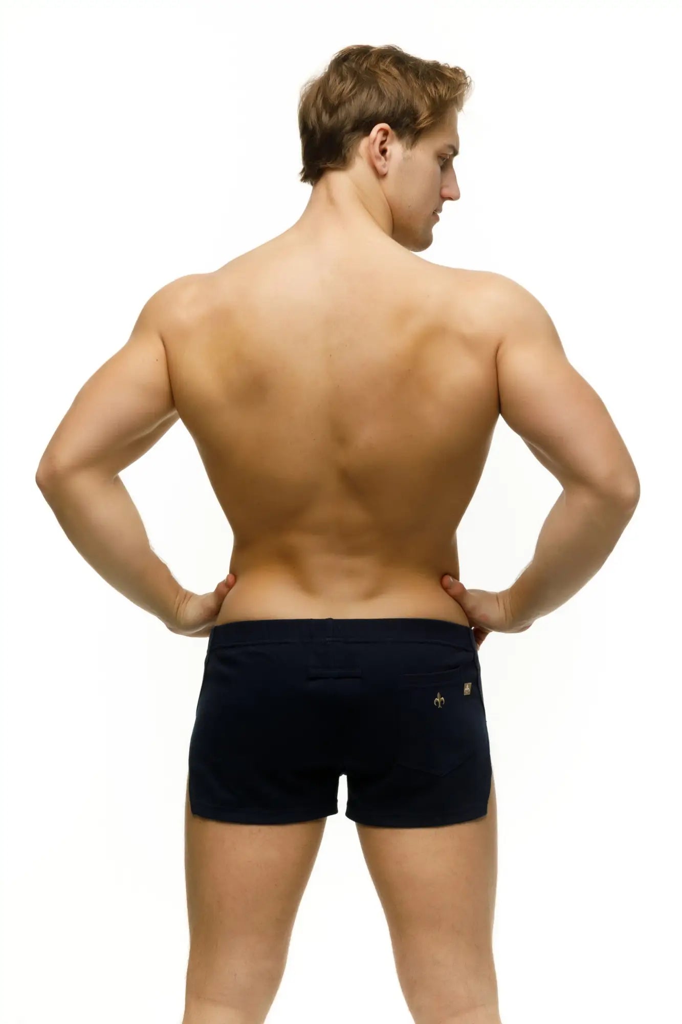 Black marcuse leisure shorts athletic briefs with a small gold logo on the lower right side