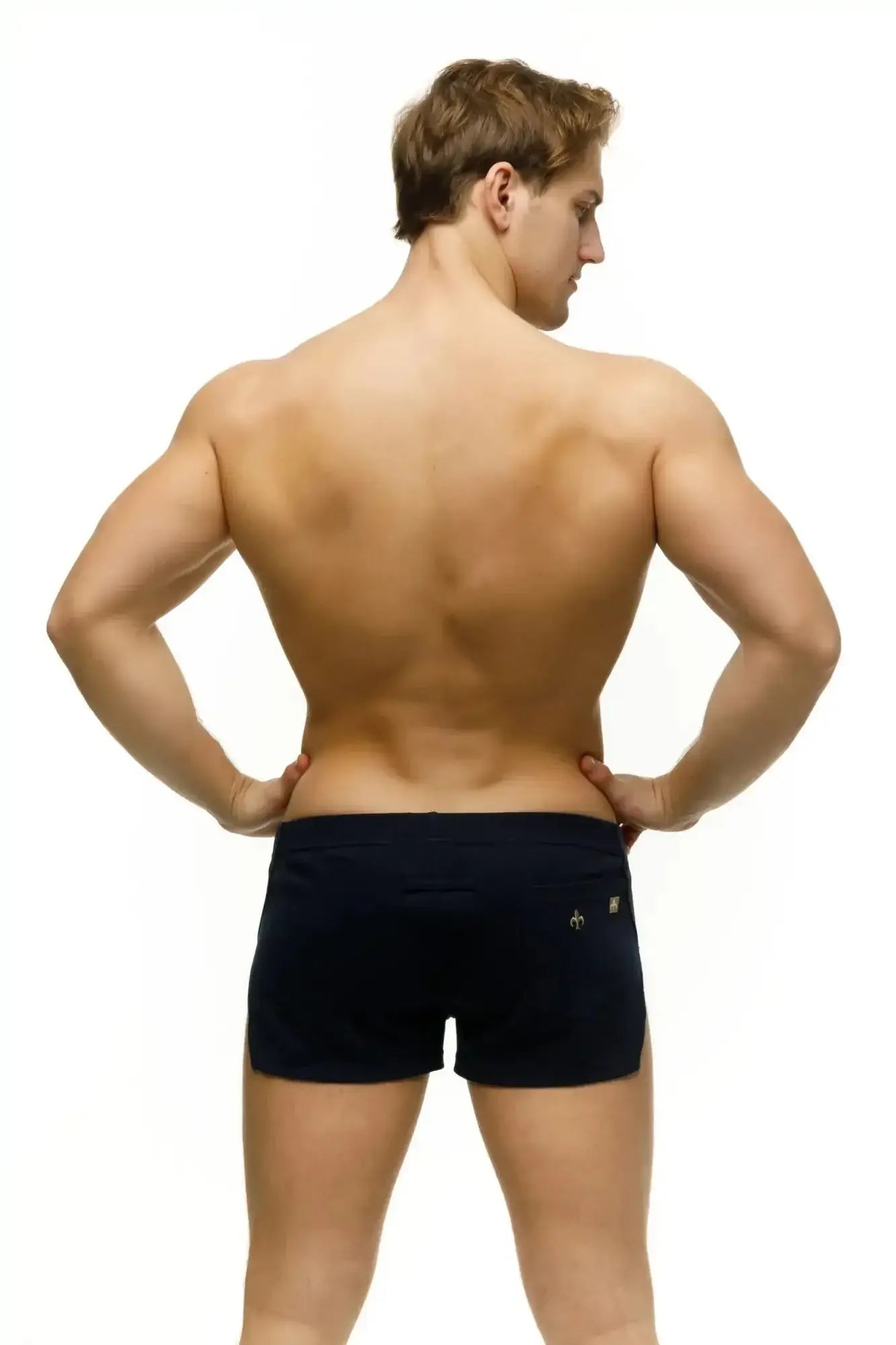 Black marcuse leisure shorts athletic briefs with a small gold logo on the lower right side