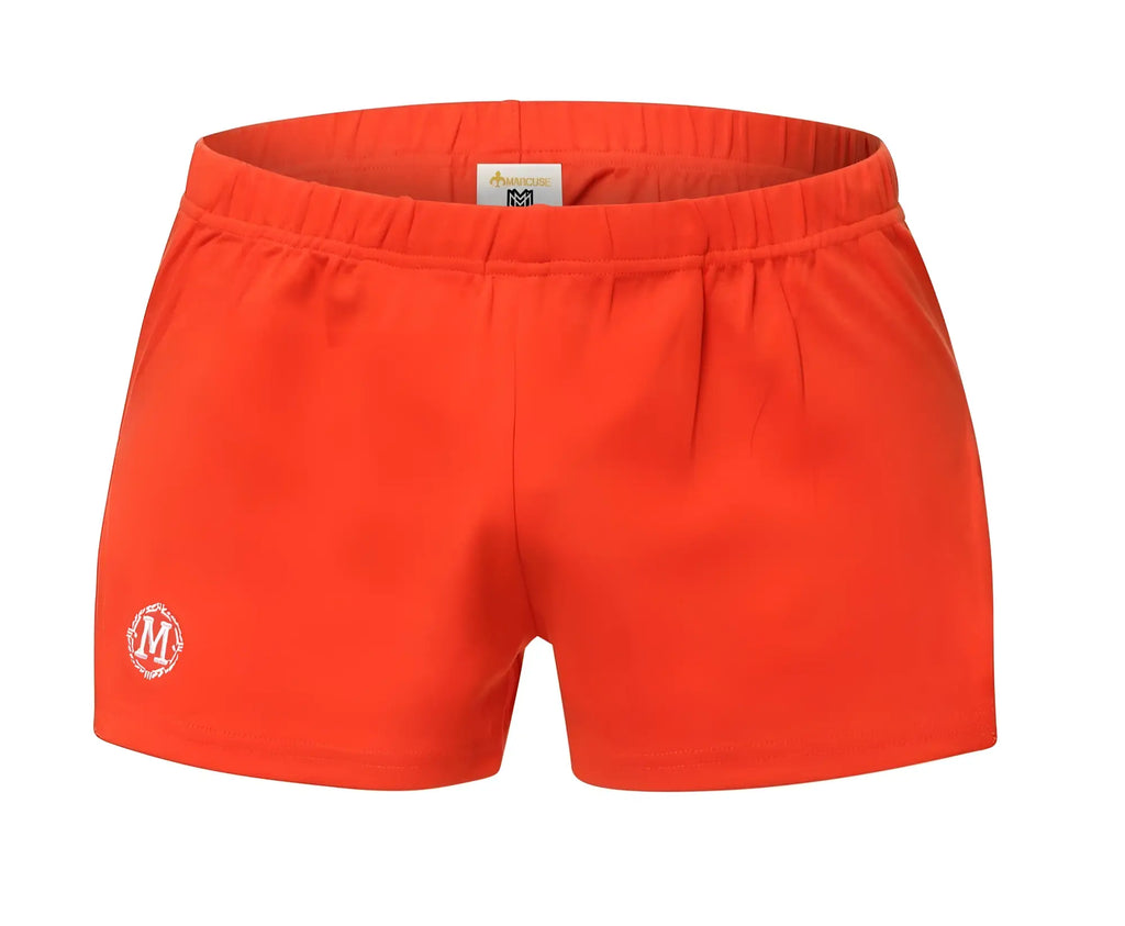 Bright orange marcuse leisure shorts with elastic waistband and small embroidered logo on left leg