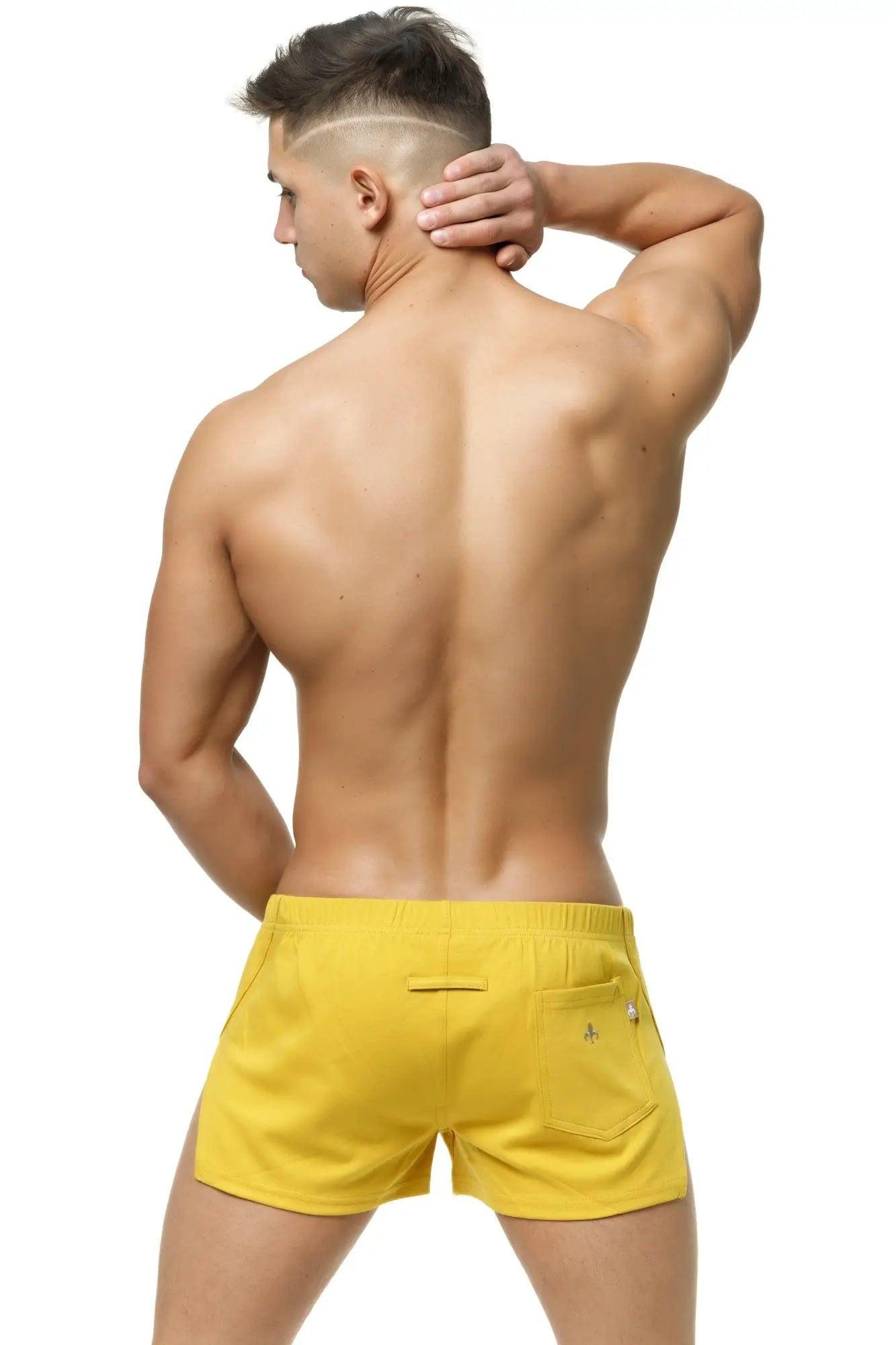 Marcuse leisure shorts in bright yellow with drawstring waistband and side pockets for athletic use