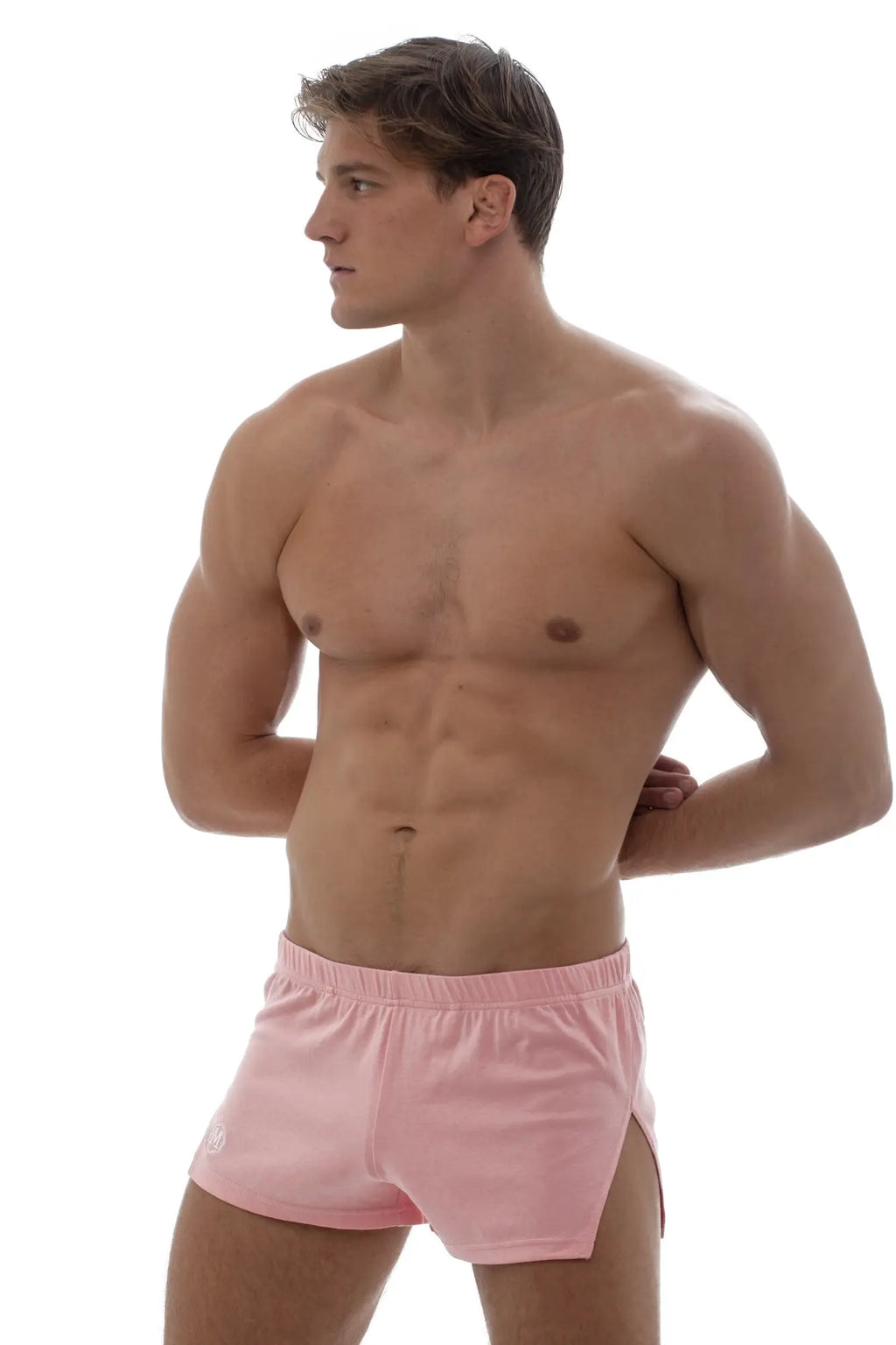 Pink marcuse leisure shorts with elastic waistband and side slit designed for athletic and casual wear
