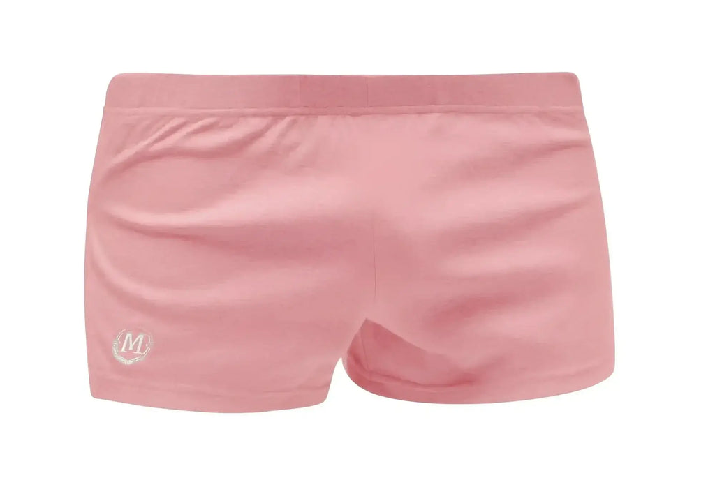 Pink marcuse leisure shorts made of soft stretchy fabric with a small embroidered logo on the lower left leg