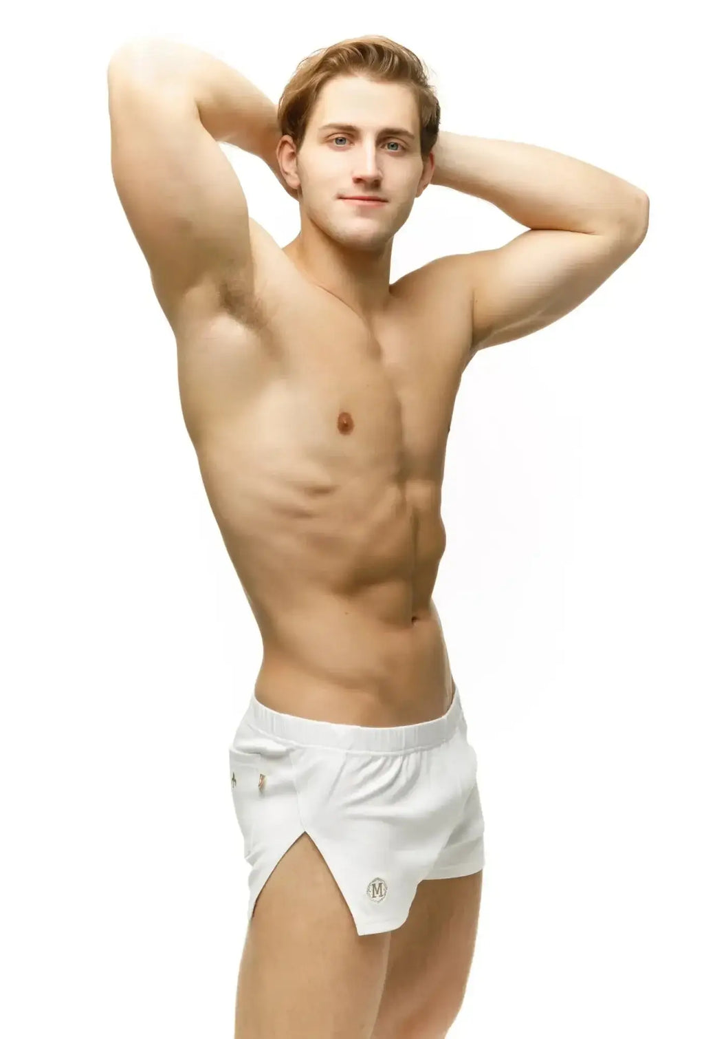 White marcuse leisure shorts made of lightweight fabric with a subtle logo on the side for athletic use