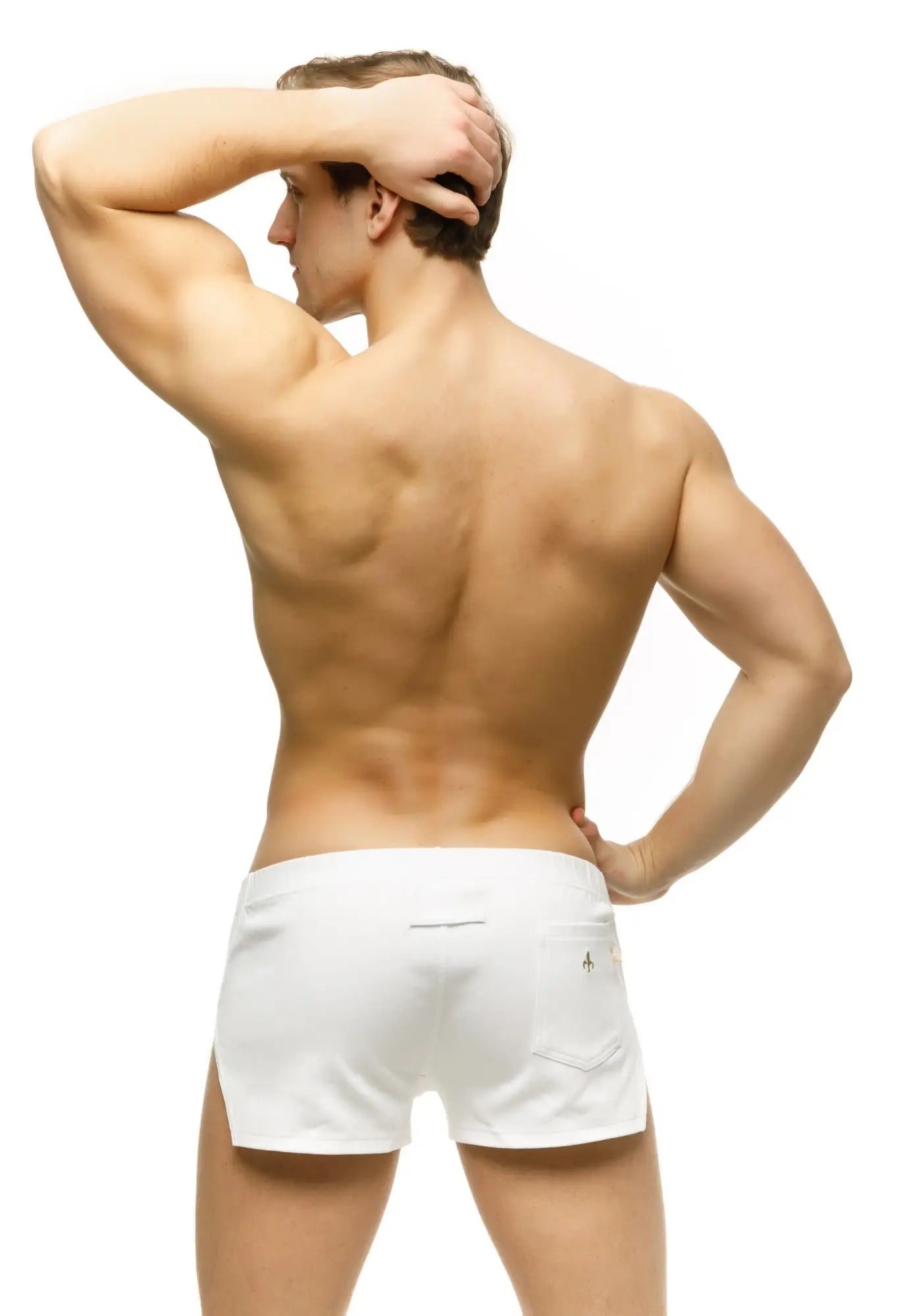 Back side of white marcuse leisure athletic shorts with a small logo on the back pocket