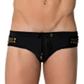Black marcuse ma_stud swim trunks with gold-toned stud accents and drawstring waistband for swimwear use
