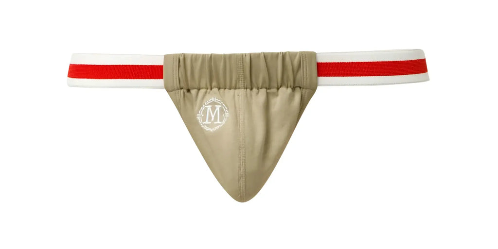 Beige Marcuse Maximo thong underwear with red and white striped waistband and circular embroidered logo on front