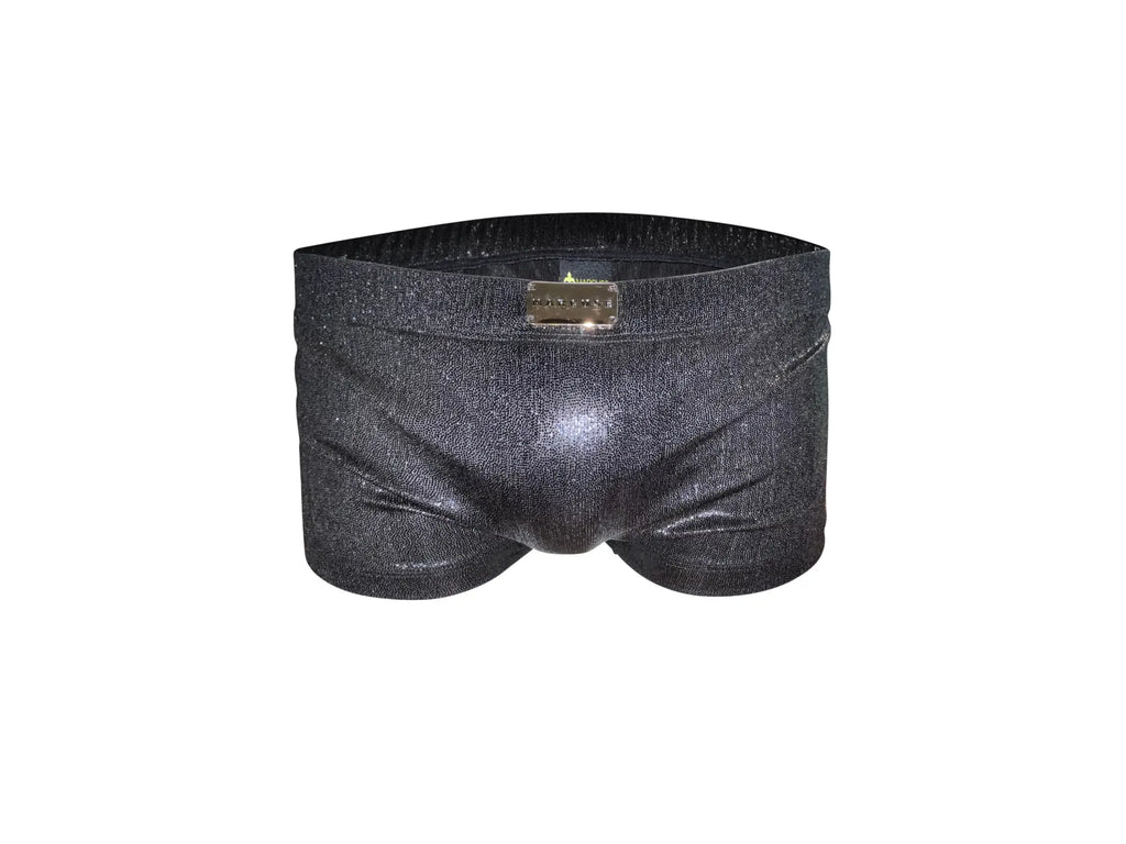 Black glittery swim trunks with metallic gold marcuse brand plaque on the waistband for stylish beachwear