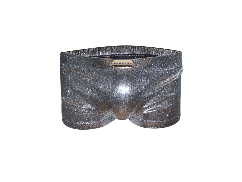 Shiny silver sequined marcuse midnight shorts with a marcuse brand label on the waistband