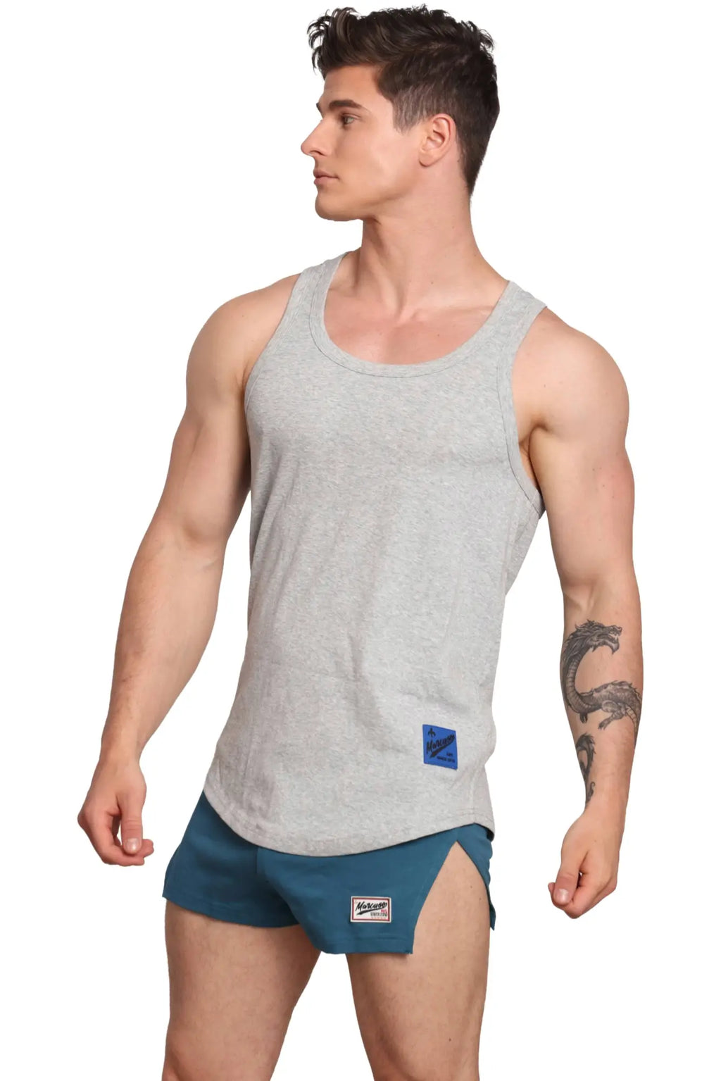 Marcuse monsieur tank top in gray heathered fabric with small blue label on the lower left side