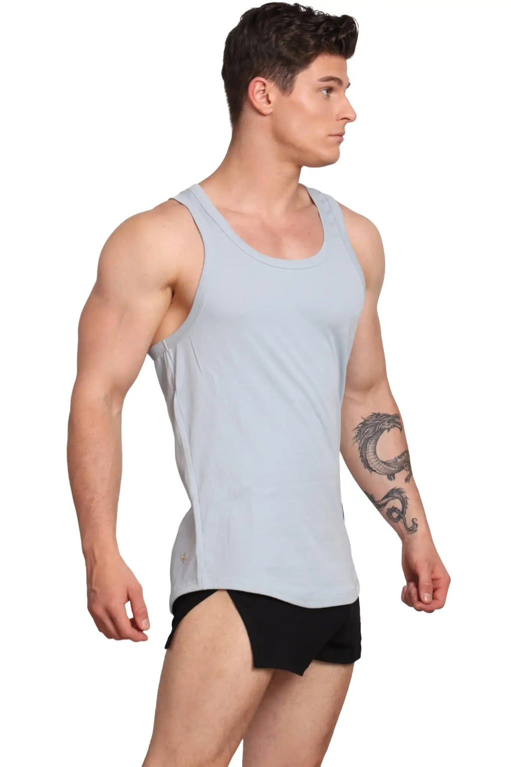 Light blue sleeveless athletic tank top by Marcuse with rounded neckline and subtle side seam detailing