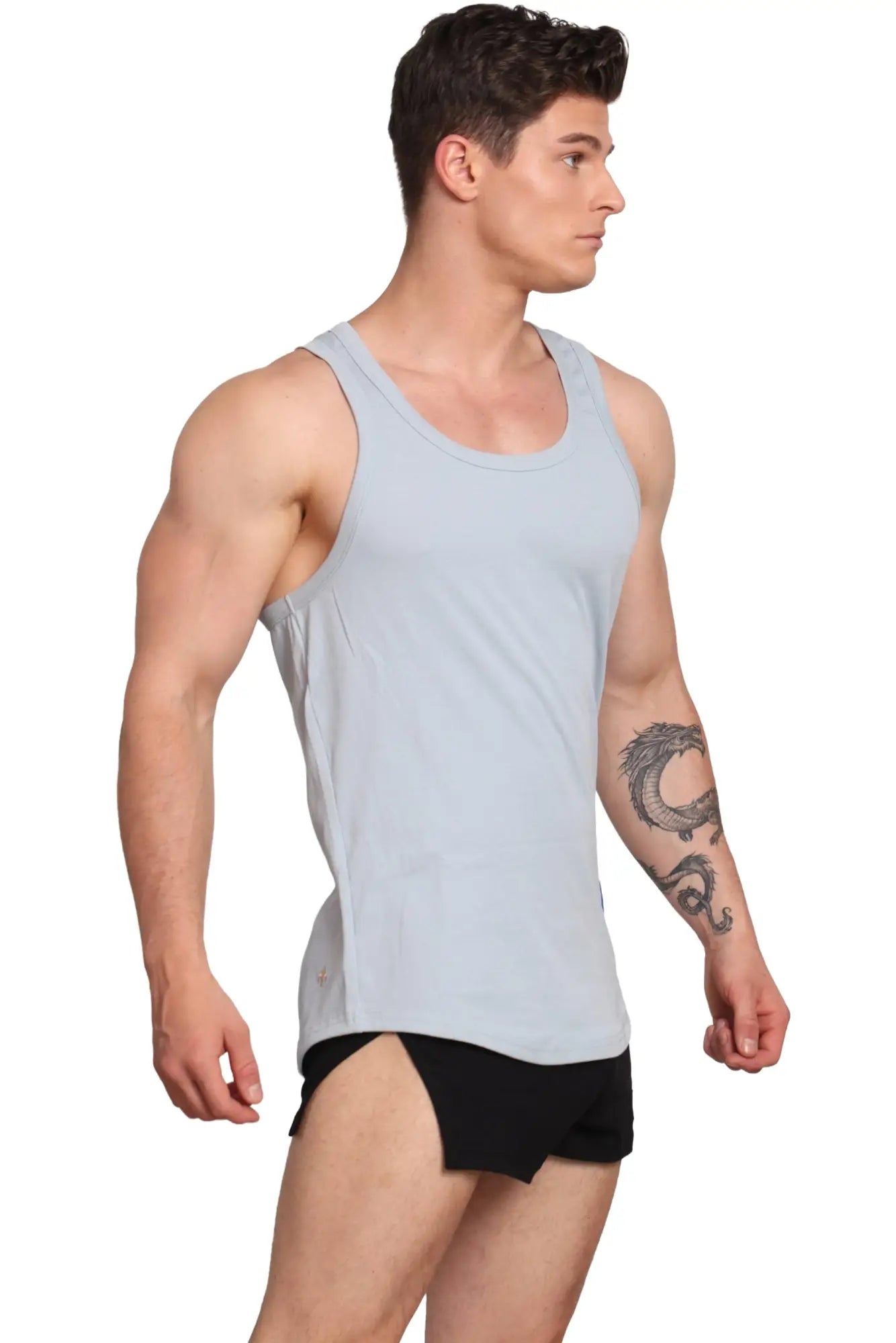 Light blue sleeveless athletic tank top by Marcuse with rounded neckline and subtle side seam detailing