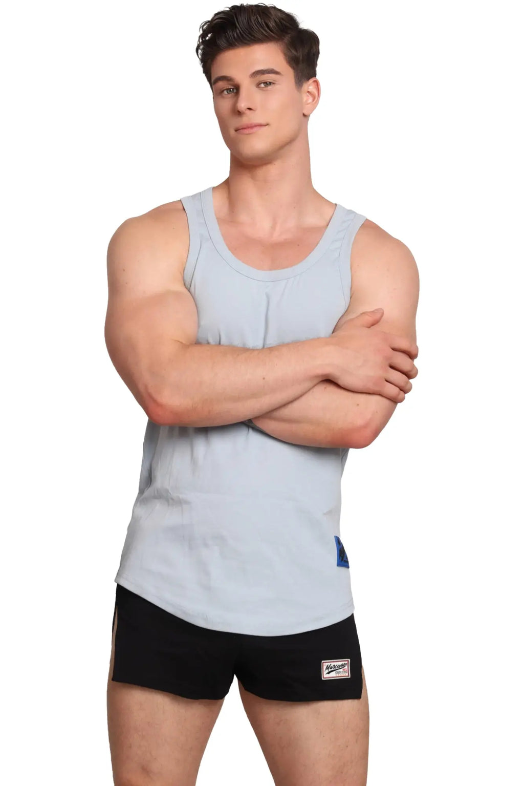 Light blue sleeveless Marcuse Monsieur tank top with rounded neckline and subtle vertical seam detail