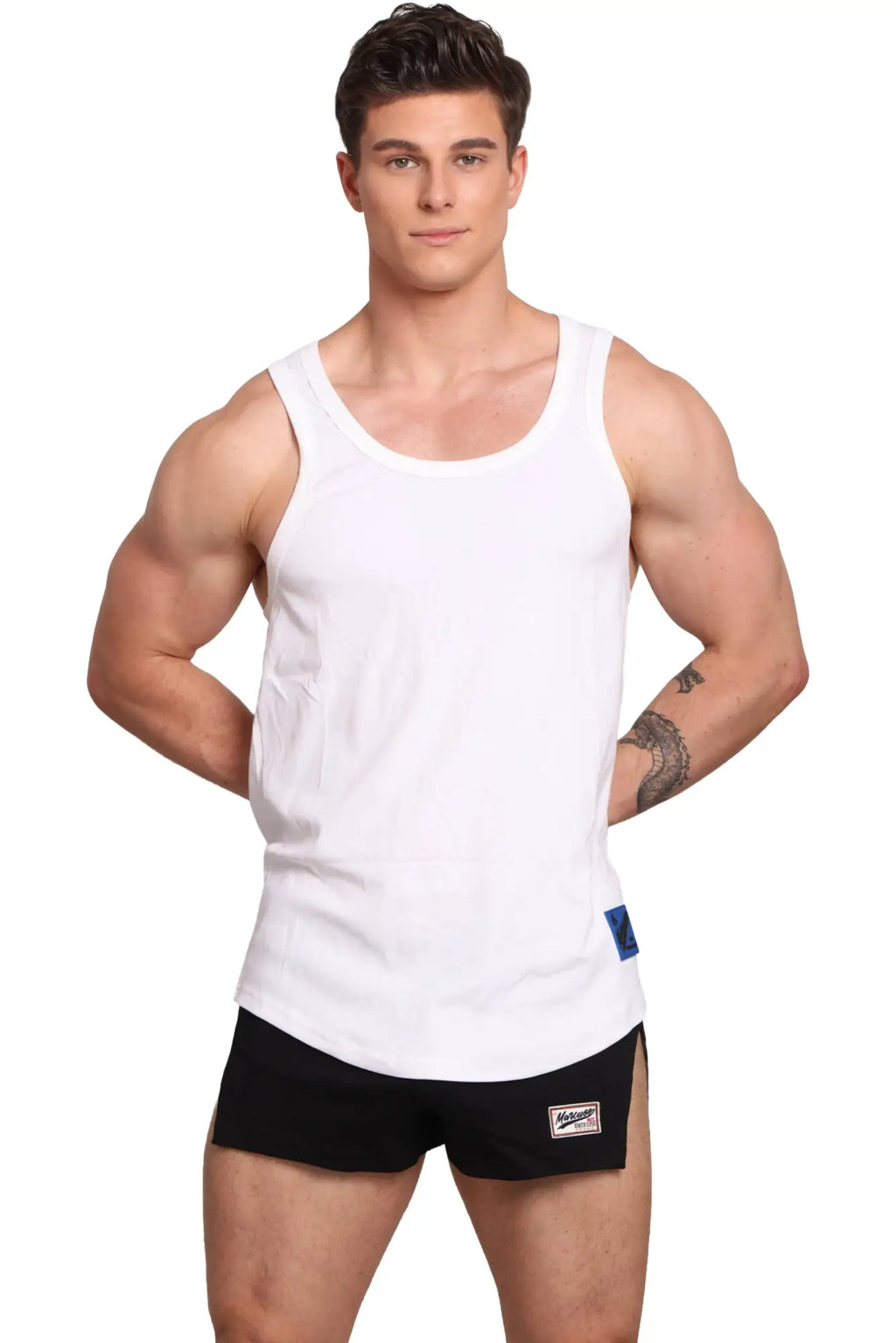 Marcuse Monsieur tank top white sleeveless with scoop neckline and subtle blue brand tag on lower right side