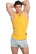 Marcuse Monsieur tank top yellow sleeveless v-neck with small blue tag on lower right side made of lightweight fabric