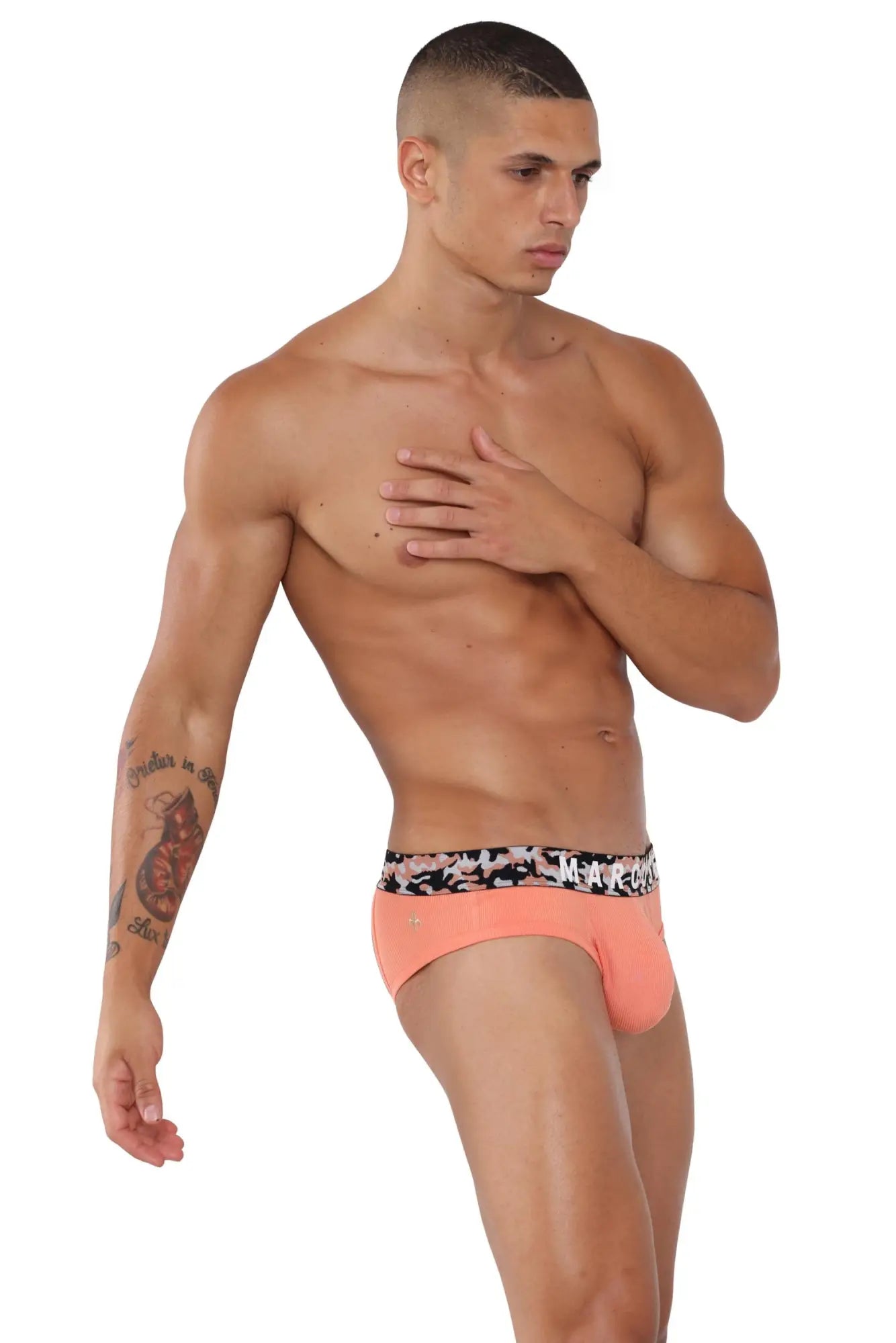 Coral-colored marcuse mosaico jock underwear briefs with a black and white patterned waistband featuring the brand name