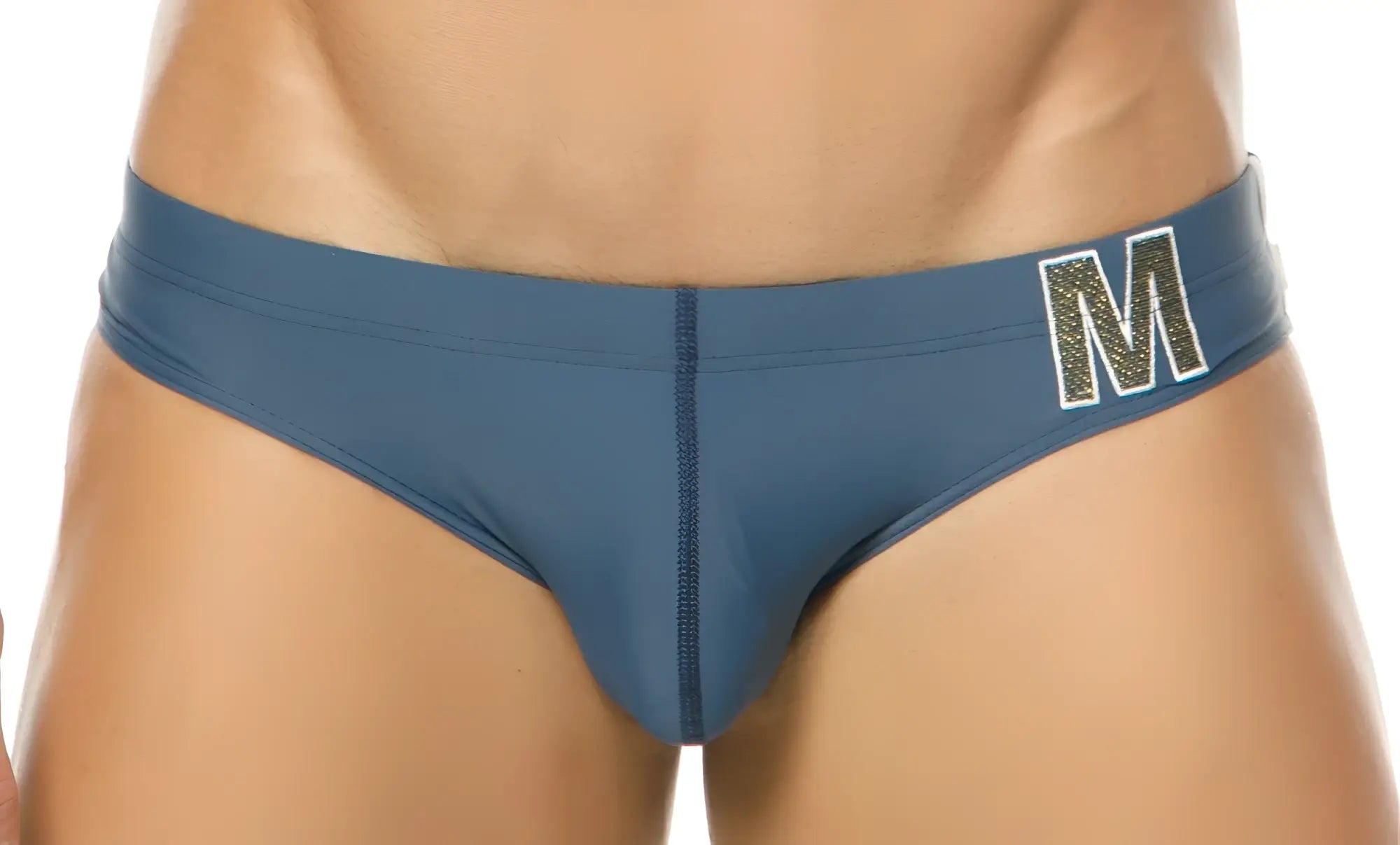 Blue men’s briefs marcuse mpire bikini swimwear with glittery gold m logo waistband for swimwear use