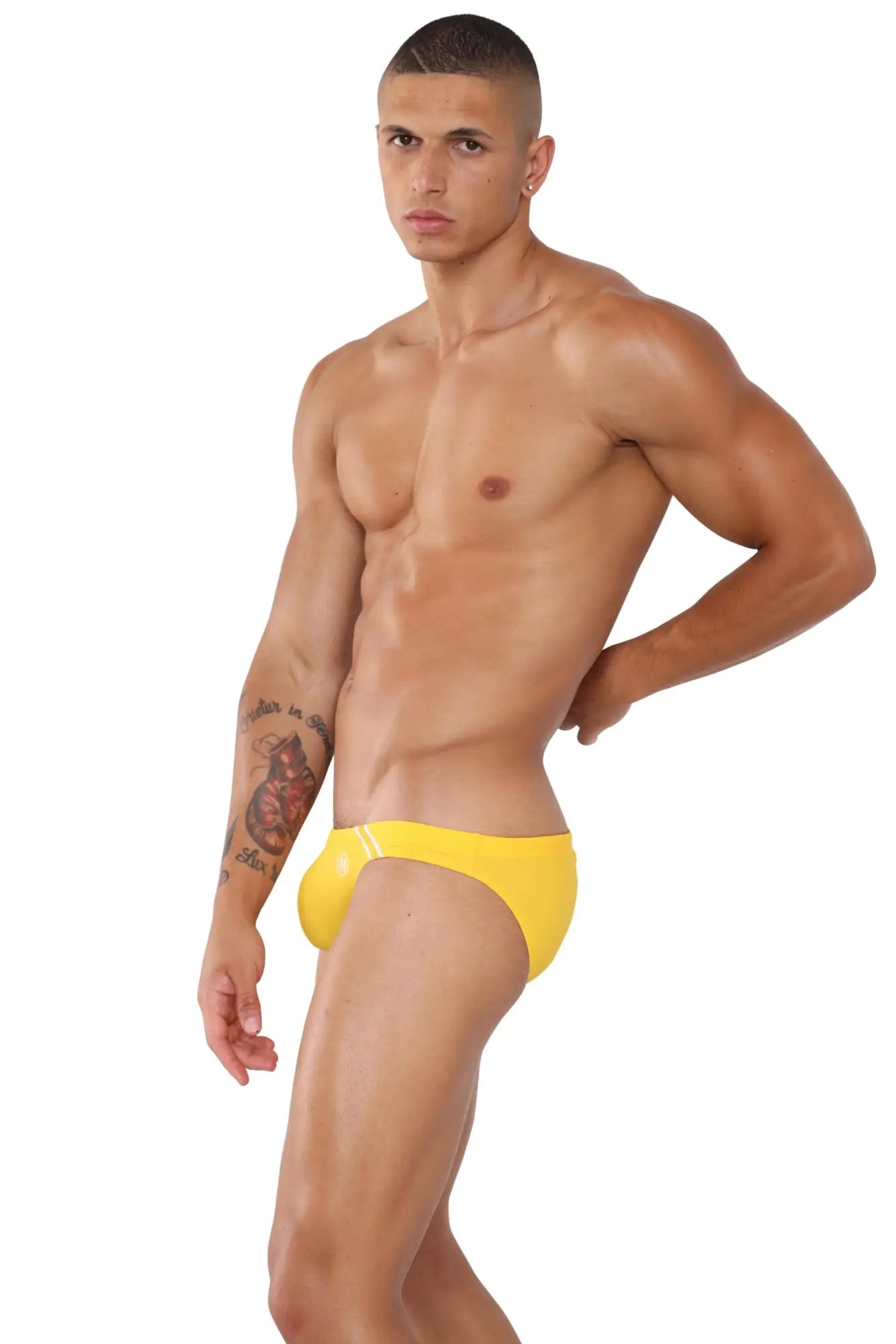 Marcuse natura bikini swimwear bright yellow sleek form-fitting swim trunks with subtle glossy finish