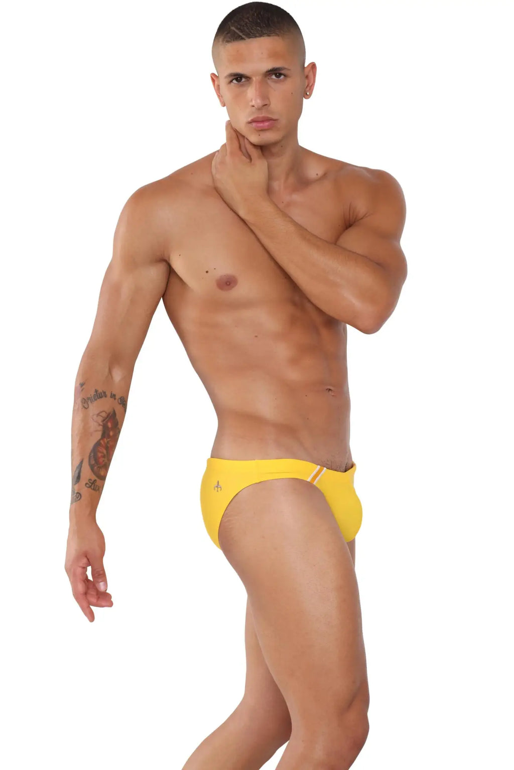 Bright yellow Marcuse Natura bikini swimwear with subtle logo on the side designed for swimming and beachwear
