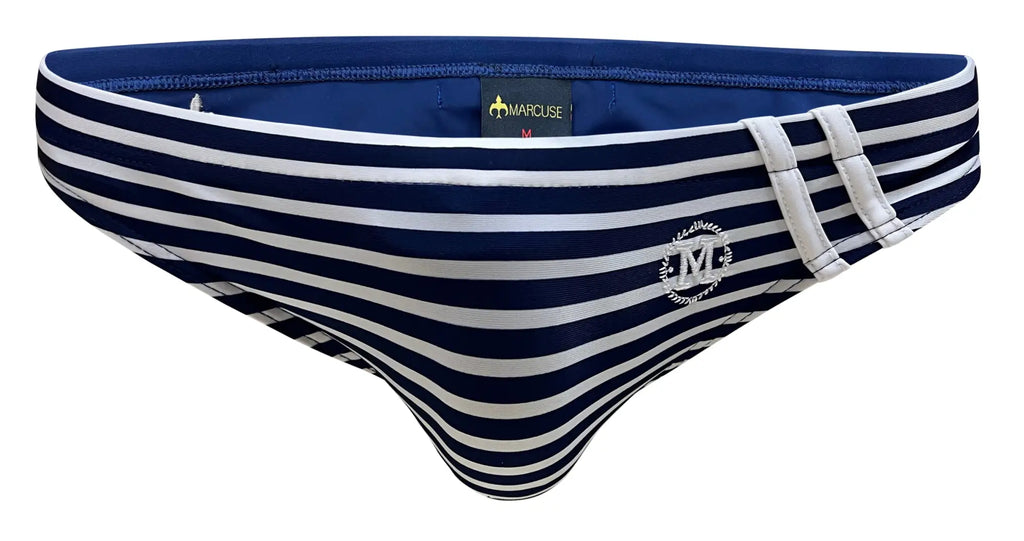 Navy blue and white striped men’s swim trunks with branded logo on side from Marcuse Obelisk bikini swimwear collection