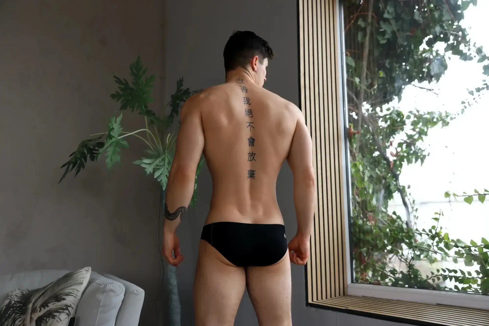 Black Marcuse Oberon brief underwear with a small white logo on the waistband in a comfortable stretch fabric
