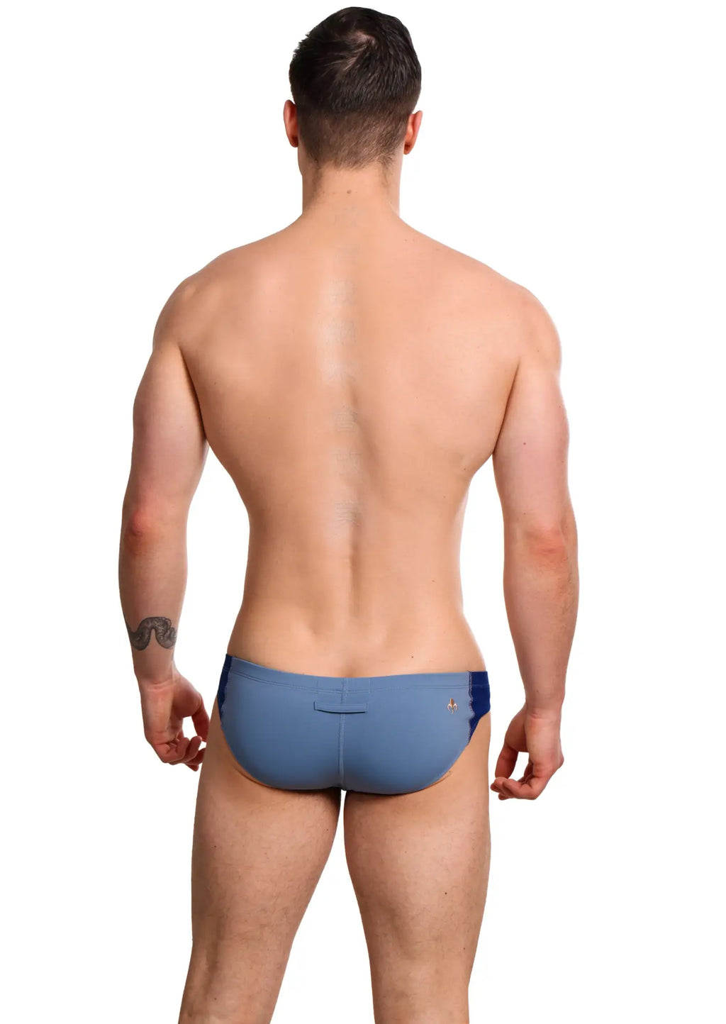 Marcuse Oberon brief underwear in blue swim trunks with subtle darker blue trim along the sides