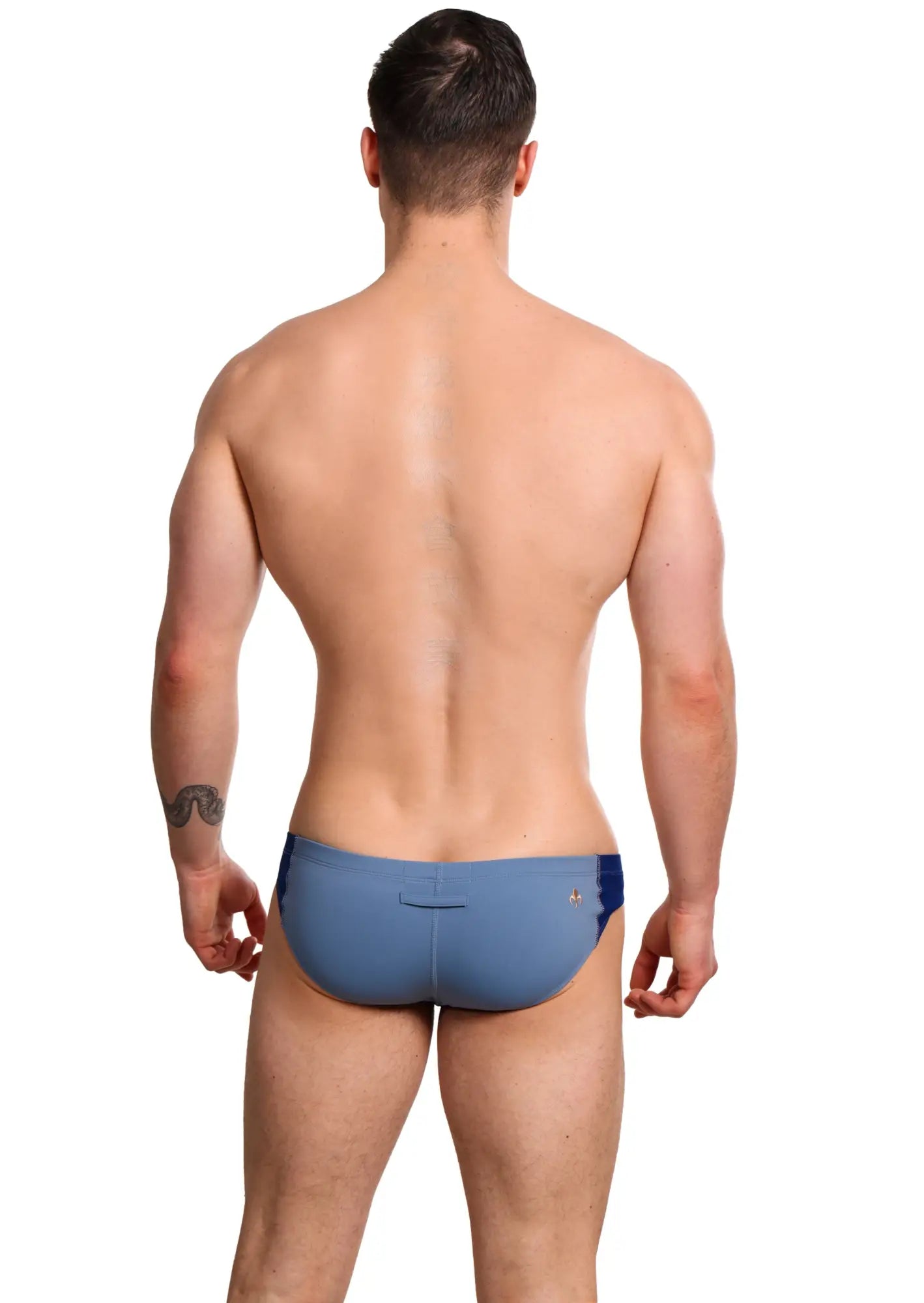 Marcuse Oberon brief underwear in blue swim trunks with subtle darker blue trim along the sides
