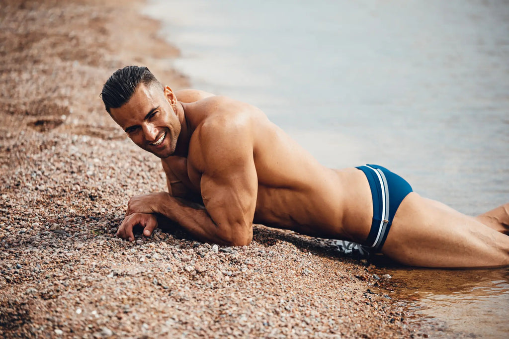 Blue swim trunks with white stripes from marcuse ocean bikini swimwear ideal for beach and pool use