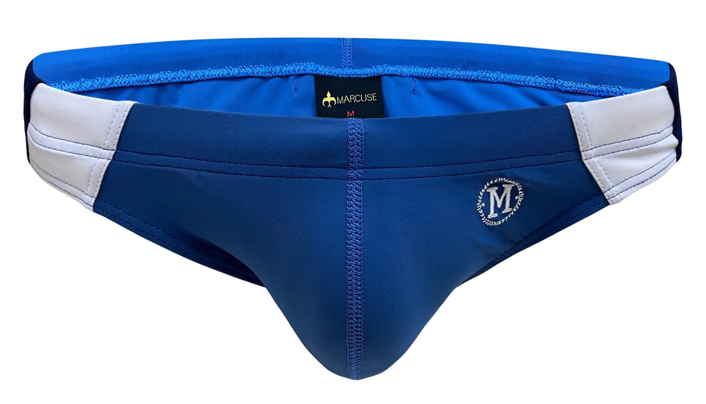 Blue and white Marcuse Odyssey bikini swimwear swim trunks with navy main body white side panels and embroidered logo