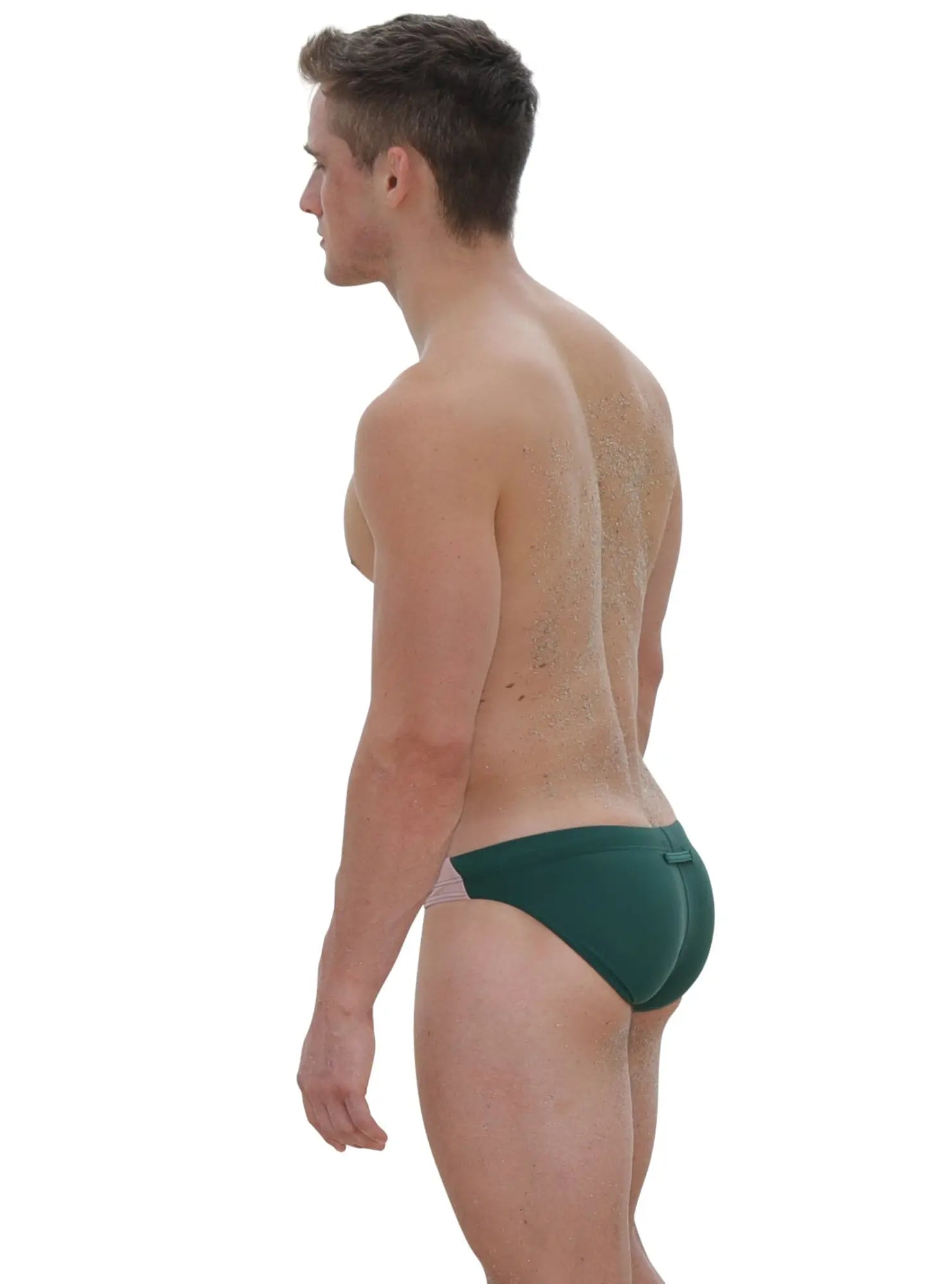 Dark green marcuse odyssey bikini swim trunks with subtle pink waistband trim for stylish swimwear use