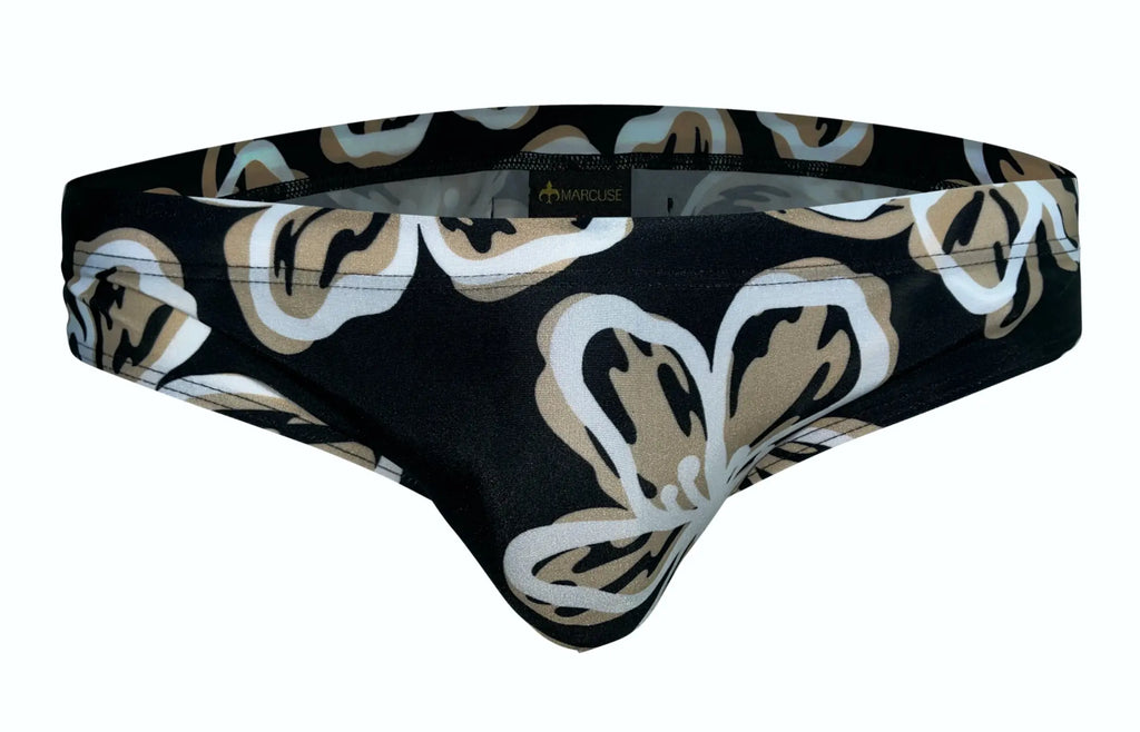 Black mens briefs Marcuse Ornate Bikini Swimwear with bold abstract white and beige floral pattern front view
